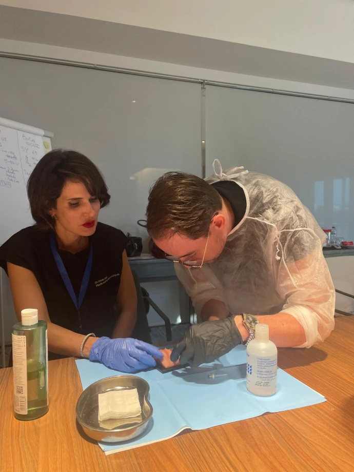 Candidate learning injections on a simulator with the guidance of Dr Amal
