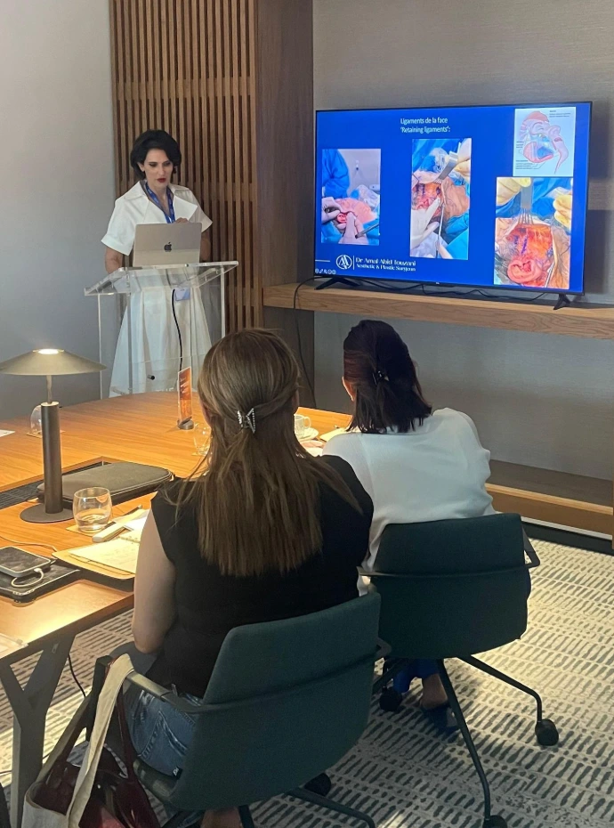 Dr Amal giving a lecture about facial anatomy